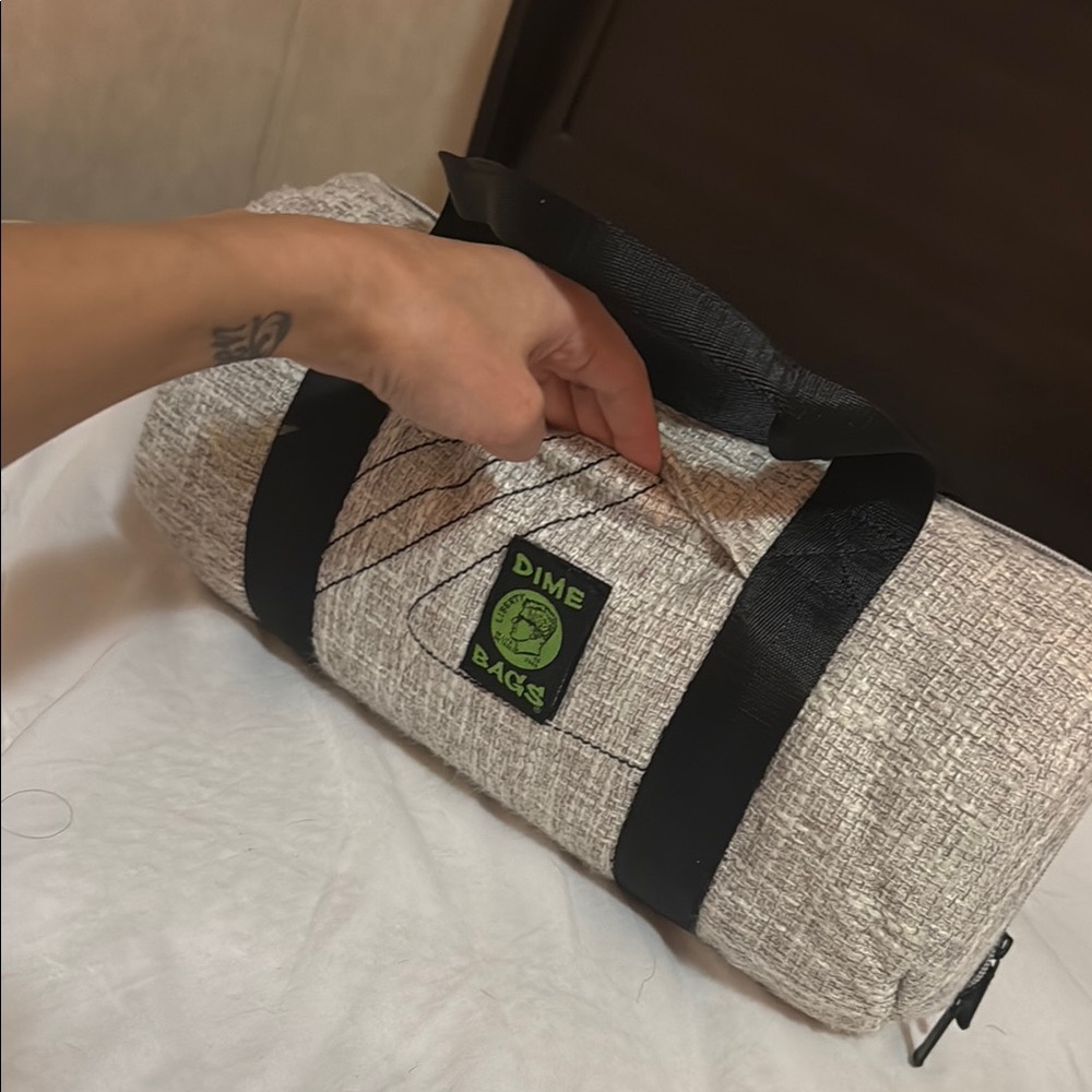 Gray Duffel Bag with Textured Fabric and Sturdy Straps